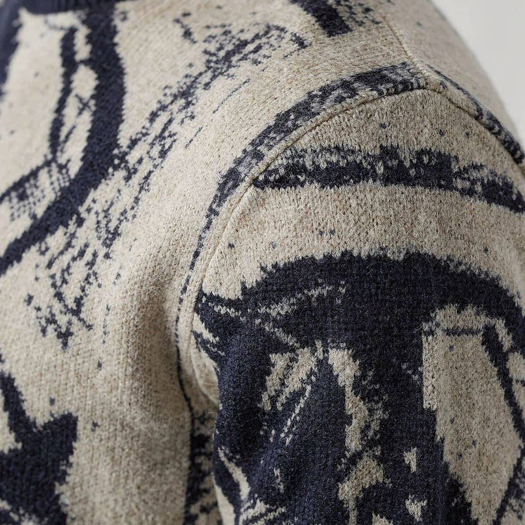 Close-up of a patterned cashmere with black and beige design